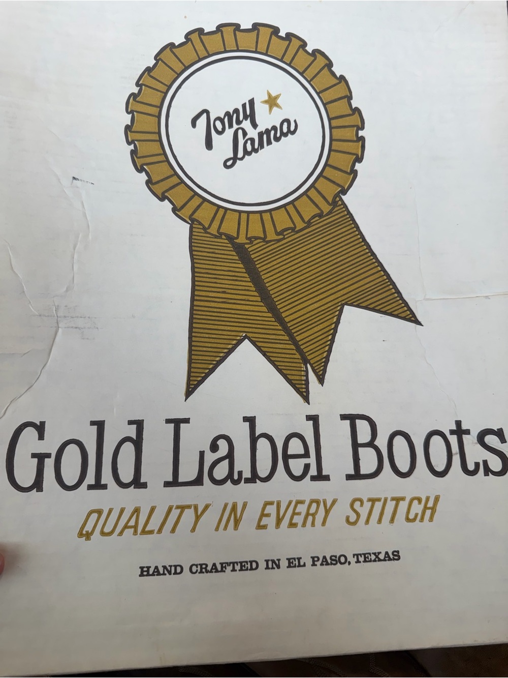 Tony Lama Gold Ribbon Badge Graphic - Gold and Black